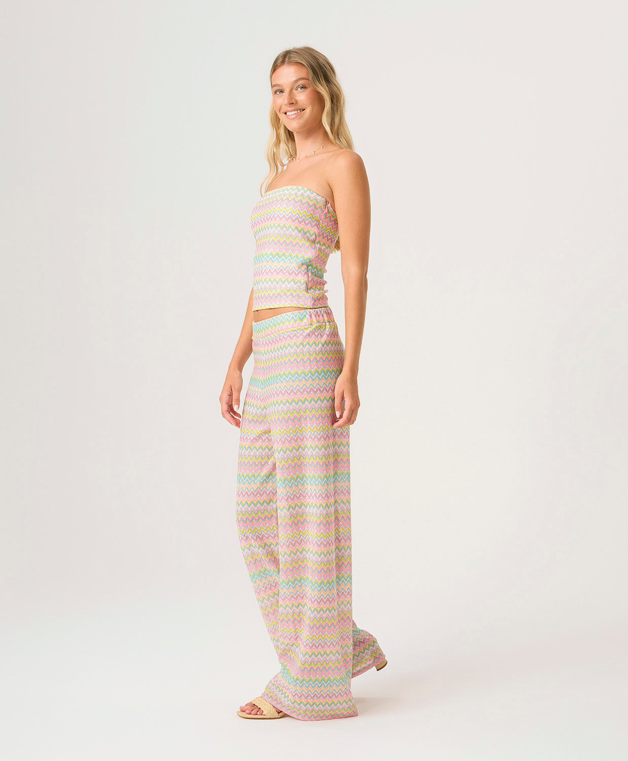 Love Spell Elle Strapless Top with shimmering pastel multicolor chevron print in a classic strapless silhouette.