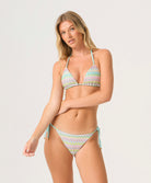 Love Spell Triangle Top bikini with pastel chevron print, shimmering fabric, and adjustable tie straps.