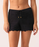 Midnight Adele Short—relaxed, ruffled resort shorts with adjustable tie waist and 24k gold-plated accents.