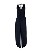 Midnight Joanne Jumpsuit in silky draped fabric with V-neckline, cinched waist, and adjustable back ties for an elegant full-length look