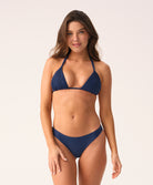 Navy low-rise bikini bottoms with a ruched back detail