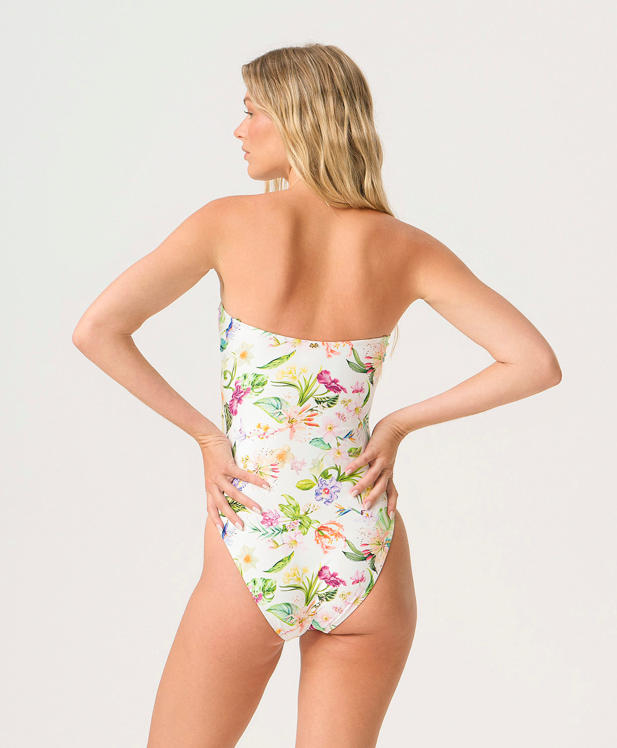 Paradise Bloom Margaux One Piece strapless swimsuit with sweetheart neckline, tropical floral print, and pastel colorblocking.