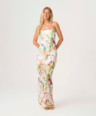 Paradise Bloom Sofia Tube Dress strapless floor-length dress with tropical floral print, sheer hem, and subtle back slit.