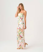 Paradise Bloom Sofia Tube Dress strapless floor-length dress with tropical floral print, sheer hem, and subtle back slit.