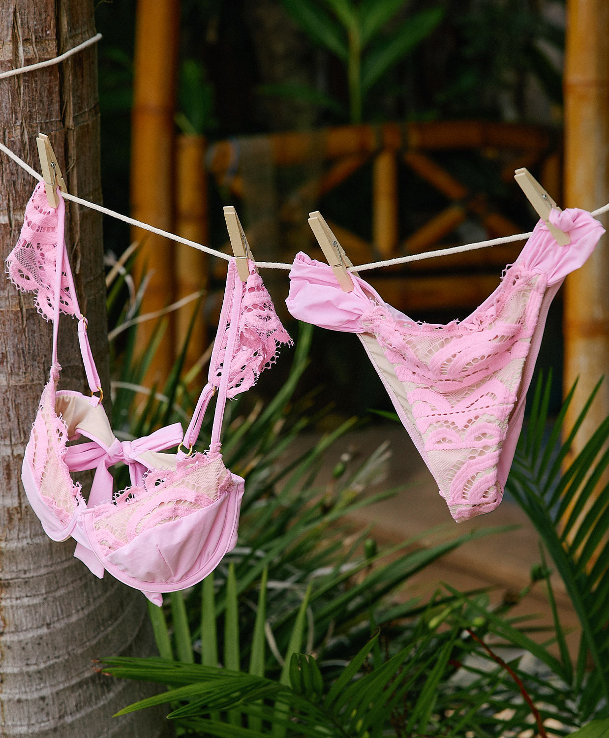 Rosé Lace Fanned Bottom bikini bottom in pastel pink with hand-cut lace and subtle back ruching for a flattering fit.