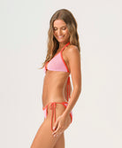 Rosé Wren Crochet Triangle Top with soft pink crochet, red color-blocked trim, and adjustable tie straps.