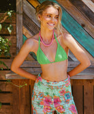 solana meg high waist pant in blue printed crochet with tropical floral design