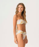 Sorrento Ring Bandeau bikini top with shimmering multicolor fabric, 24k gold-dipped ring detail, and adjustable tie back.