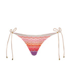 Sunkissed Tie Side Bottom in vibrant multicolor chevron print with gold accents and adjustable side ties