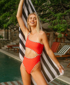 Sunset Waves Elie Asymmetric One Piece in passion red with one-shoulder cutout design and contrast piping