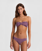 Teakwood Reversible Scalloped Bottom bikini with nautical stripes and red, scalloped trim.