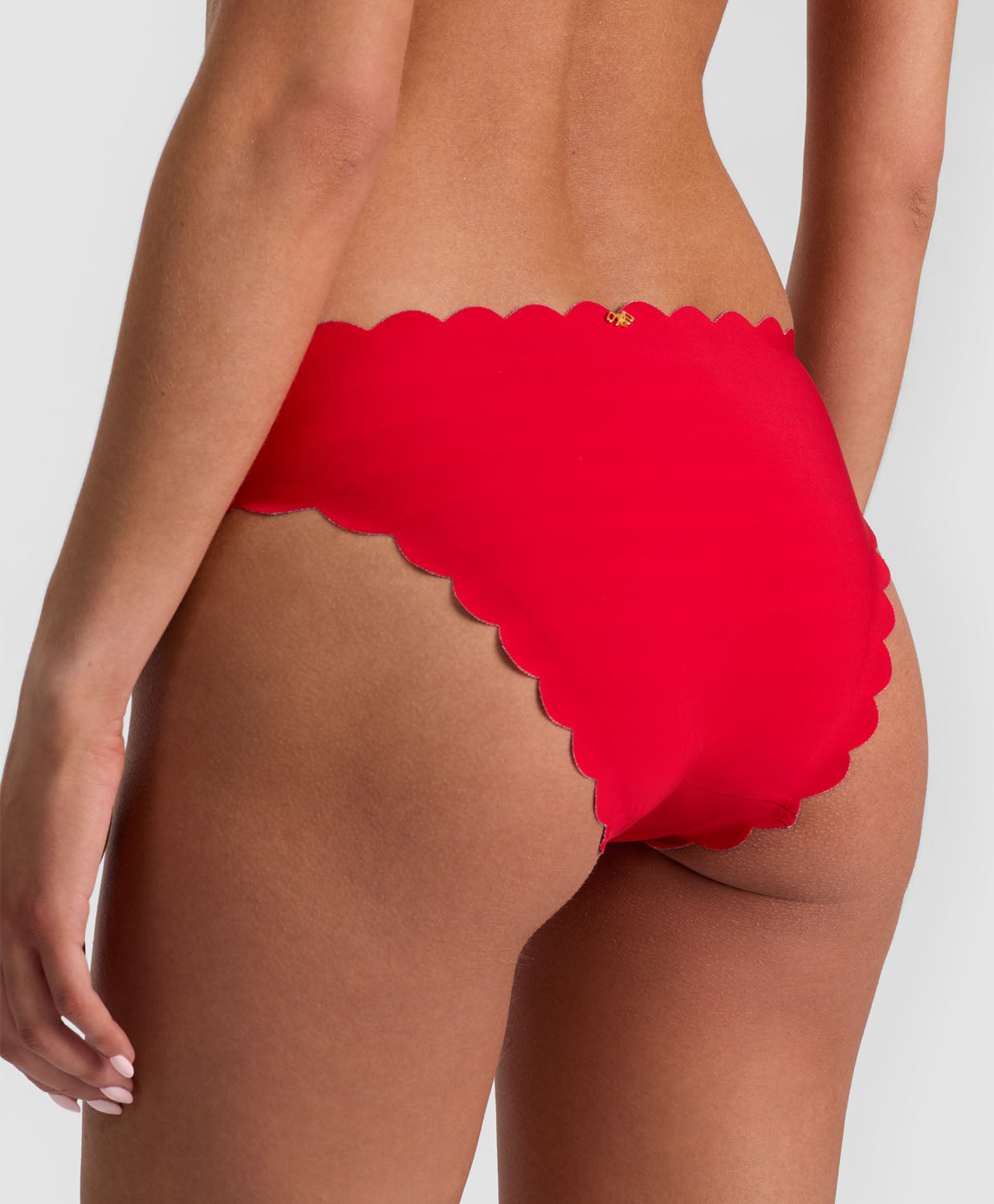 Teakwood Reversible Scalloped Bottom bikini with nautical stripes and red, scalloped trim.