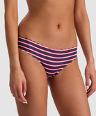 Teakwood Reversible Scalloped Bottom bikini with nautical stripes and red, scalloped trim.
