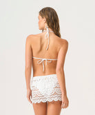 Water Lily Maycee Skirt hand-cut lace mini worn over swimwear for poolside and night-out styling