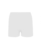 A woman wearing a white bandeau and matching shorts standing against a white wall. 