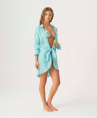 Water Millie Tie Cover Up in bright blue linen with tie closure, styled over swimwear