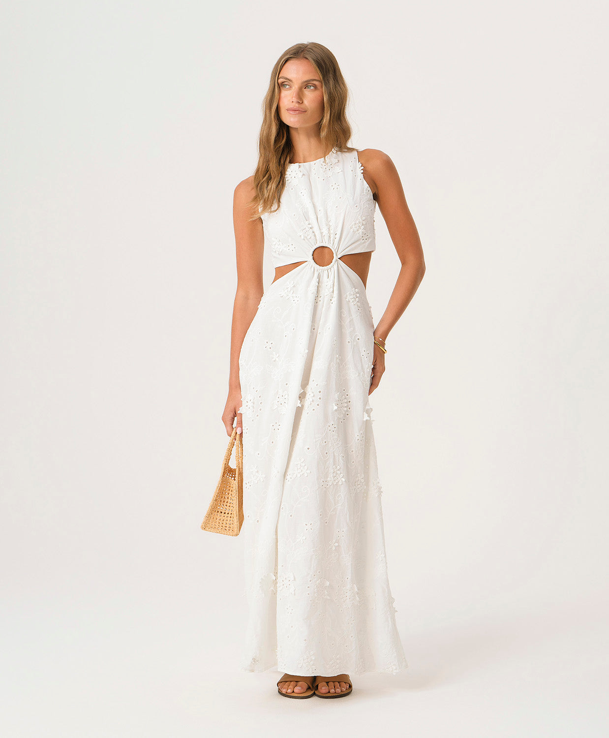 White Sands Tavi Dress in textured white eyelet fabric with center cutout and full-length feminine silhouette