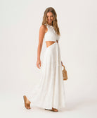 White Sands Tavi Dress in textured white eyelet fabric with center cutout and full-length feminine silhouette